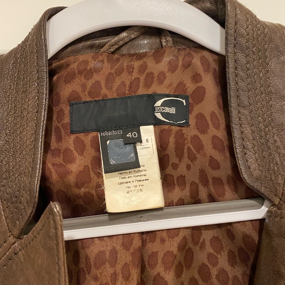 Size 40 usually runs as size small. Perfect condition designer collection.